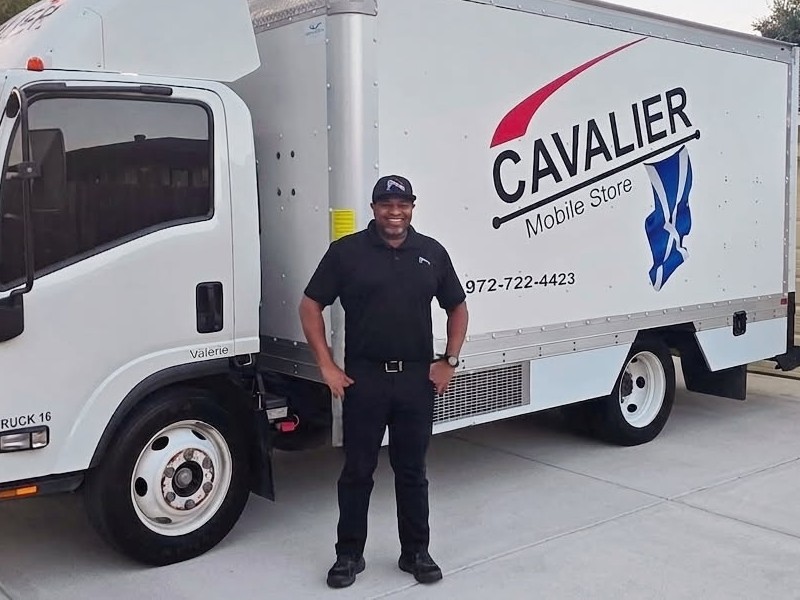 Mark Clay, Central DFW route representative, with his Cavalier Mobile Store route truck
